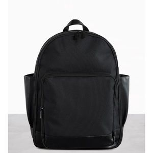 Lightly used beis backpack